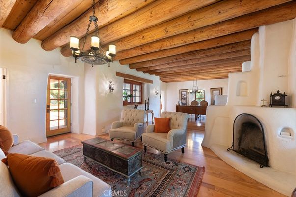 Chandelier, Fireplace, Interior, Living room, Pendant Lights, Piano, Wooden Beams, Wooden Ceilings, Wood Texture Flooring