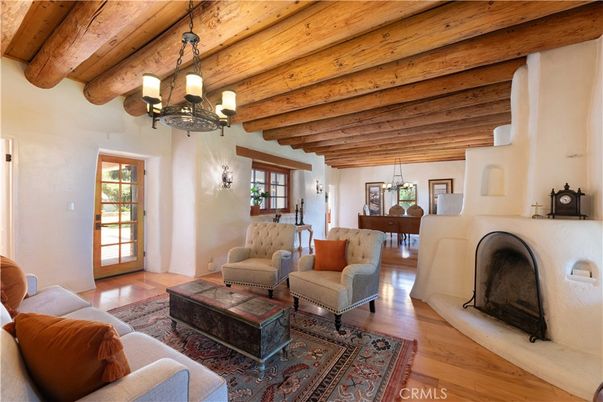 Chandelier, Fireplace, Interior, Living room, Pendant Lights, Piano, Wooden Beams, Wooden Ceilings, Wood Texture Flooring