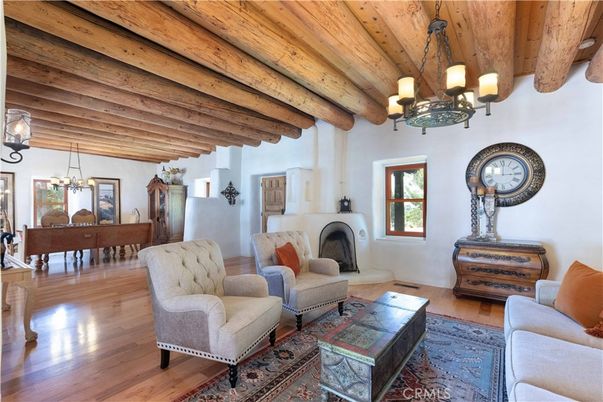 Chandelier, Fireplace, Interior, Living room, Pendant Lights, Wooden Beams, Wooden Ceilings, Wood Texture Flooring