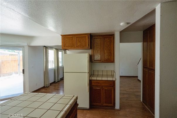 Interior, Kitchen, Tile Countertops, Wood Texture Flooring