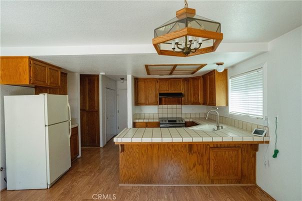Interior, Kitchen, Tile Countertops, Wood Texture Flooring