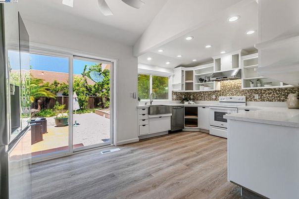 Interior, Kitchen, Recessed Lighting, Stainless Steel Appliances, Wood Texture Flooring