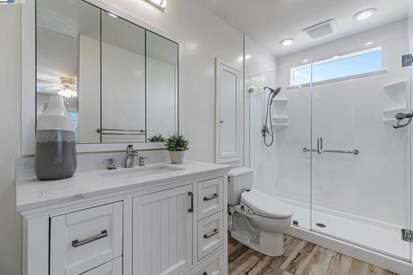 Bathroom, Glass Shower, Interior, Recessed Lighting, Wood Texture Flooring