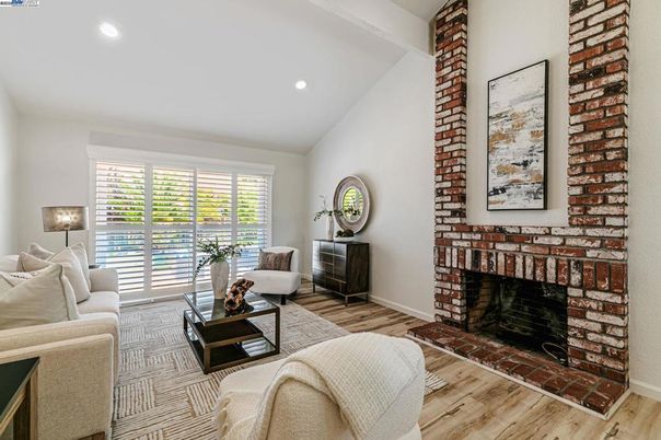 Fireplace, Interior, Living room, Recessed Lighting, Stone Walls, Wood Texture Flooring