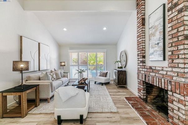 Fireplace, Interior, Living room, Recessed Lighting, Stone Walls, Wood Texture Flooring