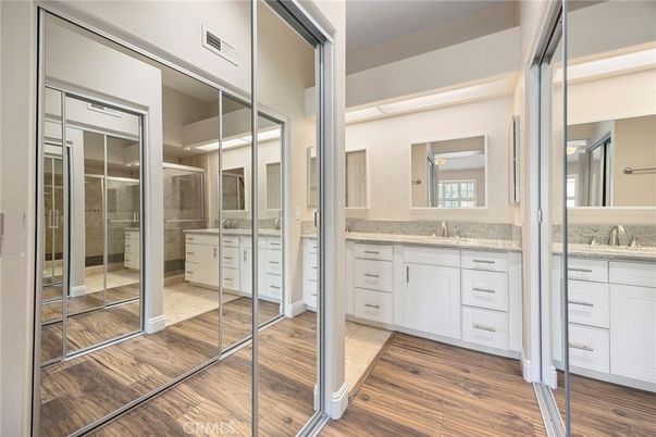 Bathroom, Dual Sink Vanities, Interior, Walk-in Closets, Wood Texture Flooring