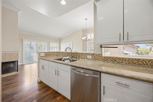 Fireplace, Interior, Kitchen, Pendant Lights, Recessed Lighting, Wood Texture Flooring