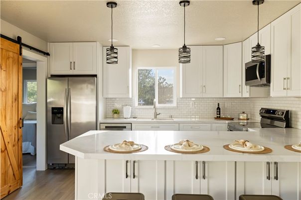Interior, Kitchen, Pendant Lights, Recessed Lighting, Stainless Steel Appliances, Wood Texture Flooring