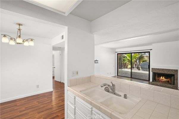 Bathroom, Fireplace, Interior, Pendant Lights, Tile Countertops, Wood Texture Flooring