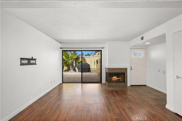 Empty room, Fireplace, Interior, Recessed Lighting, Wood Texture Flooring