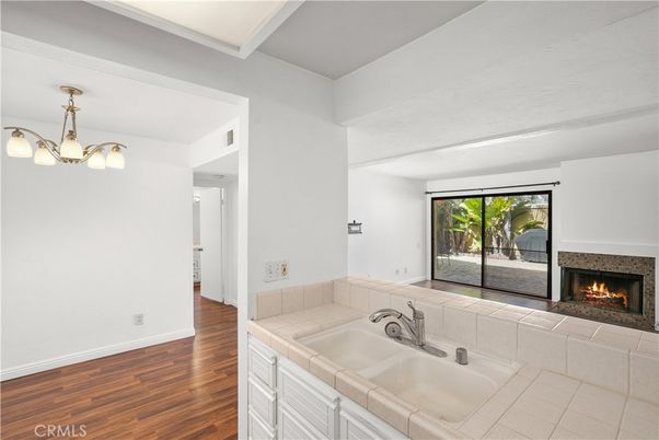 Bathroom, Fireplace, Interior, Pendant Lights, Tile Countertops, Wood Texture Flooring