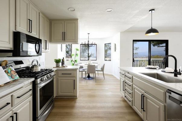 Chandelier, Dining room, Interior, Kitchen, Pendant Lights, Recessed Lighting, Water, Wood Texture Flooring