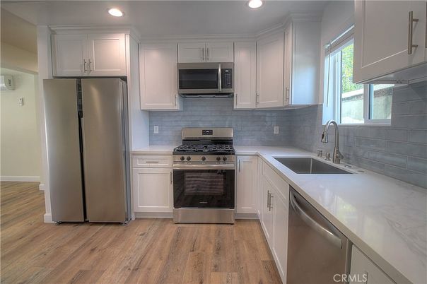 Interior, Kitchen, Recessed Lighting, Stainless Steel Appliances, Wood Texture Flooring