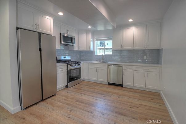 Interior, Kitchen, Recessed Lighting, Stainless Steel Appliances, Wood Texture Flooring