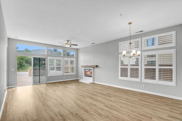 Empty room, Fireplace, Interior, Pendant Lights, Wood Texture Flooring