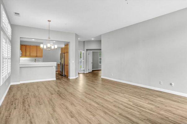 Chandelier, Empty room, Interior, Kitchen, Recessed Lighting, Wood Texture Flooring