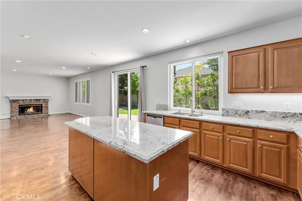 Fireplace, Interior, Kitchen, Recessed Lighting, Wood Texture Flooring