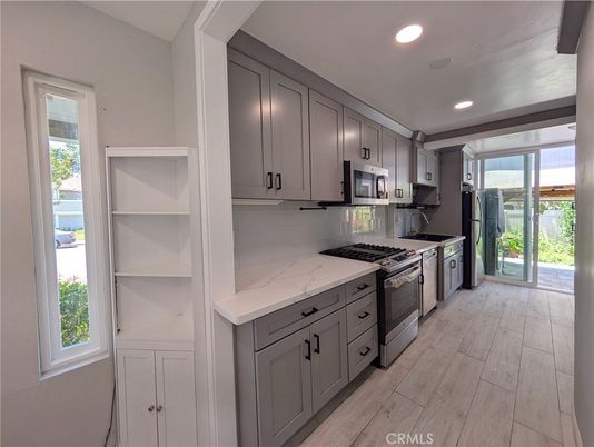 Interior, Kitchen, Recessed Lighting, Stainless Steel Appliances, Wood Texture Flooring