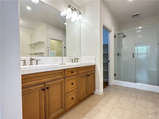 Bathroom, Dual Sink Vanities, Glass Shower, Interior, Recessed Lighting, Tile Countertops