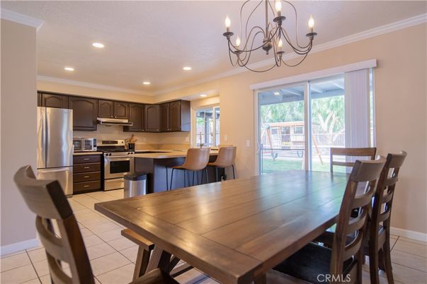 Chandelier, Dining room, Interior, Kitchen, Recessed Lighting, Stainless Steel Appliances