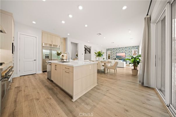 Dining room, Interior, Kitchen, Living room, Recessed Lighting, Stainless Steel Appliances, Wood Texture Flooring