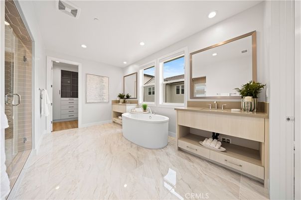 Bathroom, Dual Sink Vanities, Free Standing Baths, Interior, Marble, Recessed Lighting, Wood Texture Flooring