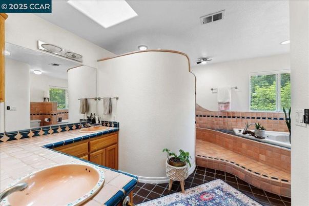 Bathroom, Dual Sink Vanities, Interior, Recessed Lighting, Tile Countertops