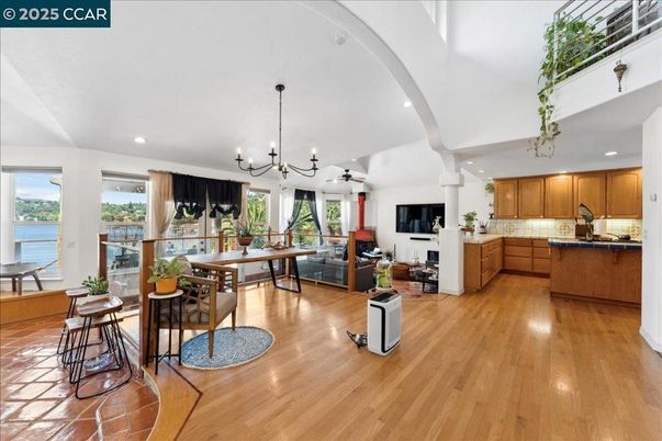 Chandelier, Dining room, Interior, Kitchen, Living room, Pendant Lights, Recessed Lighting, Water, Wood Texture Flooring