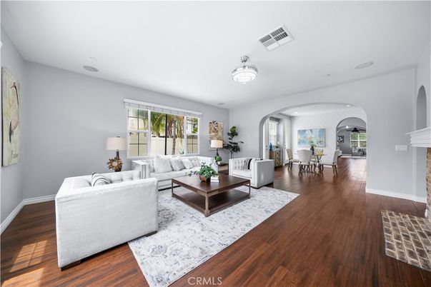 Dining room, Fireplace, Interior, Living room, Recessed Lighting, Wood Texture Flooring