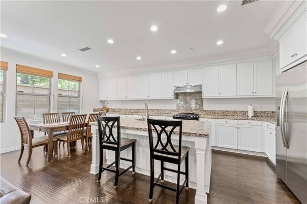 Dining room, Interior, Kitchen, Recessed Lighting, Stainless Steel Appliances, Wood Texture Flooring