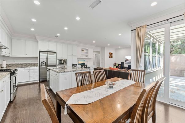 Dining room, Interior, Kitchen, Recessed Lighting, Stainless Steel Appliances, Wood Texture Flooring