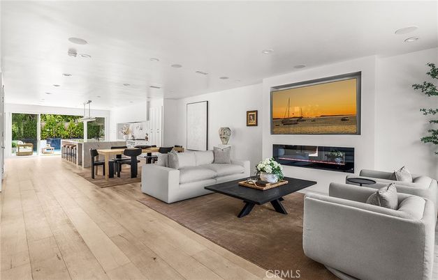Dining room, Fireplace, Interior, Living room, Pendant Lights, Recessed Lighting, Wood Texture Flooring