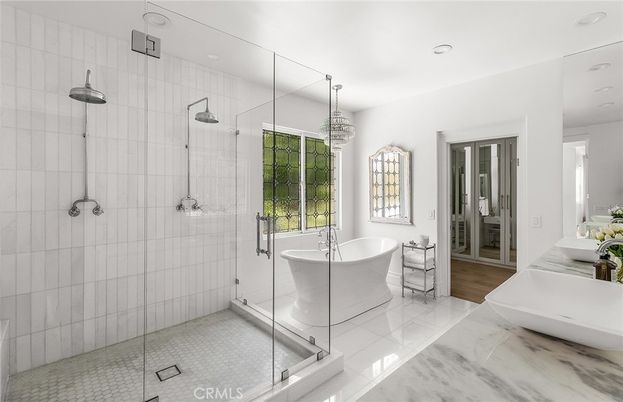 Bathroom, Chandelier, Dual Sink Vanities, Free Standing Baths, Glass Shower, Interior, Recessed Lighting, Wood Texture Flooring