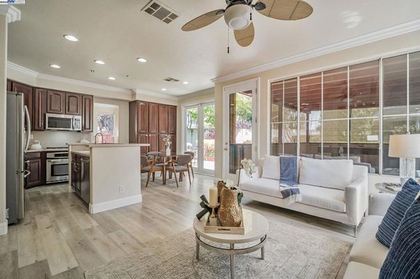 Dining room, Interior, Kitchen, Living room, Recessed Lighting, Stainless Steel Appliances, Wood Texture Flooring