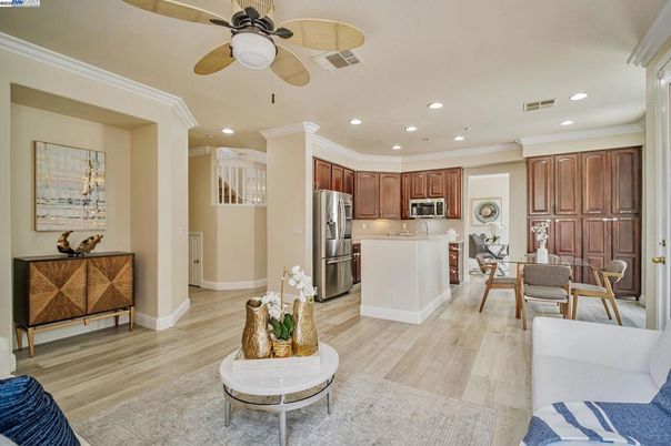 Dining room, Interior, Kitchen, Living room, Recessed Lighting, Stainless Steel Appliances, Wood Texture Flooring