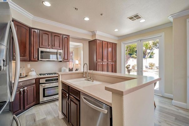 Interior, Kitchen, Recessed Lighting, Stainless Steel Appliances, Wood Texture Flooring