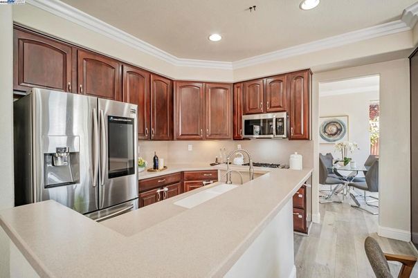 Dining room, Interior, Kitchen, Recessed Lighting, Stainless Steel Appliances, Wood Texture Flooring