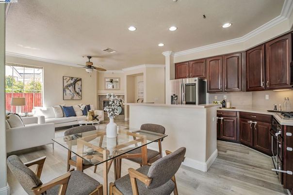Dining room, Interior, Kitchen, Living room, Recessed Lighting, Stainless Steel Appliances, Wood Texture Flooring