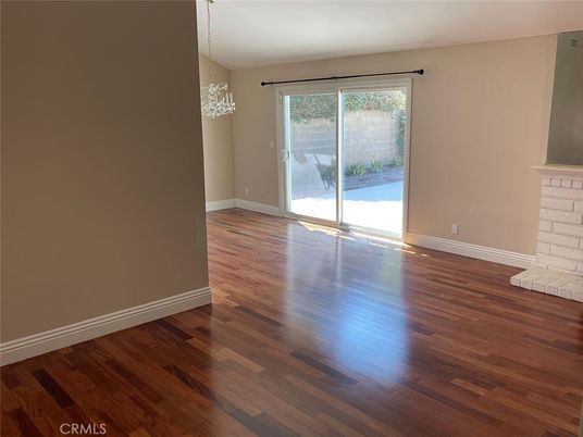 Chandelier, Empty room, Fireplace, Interior, Wood Texture Flooring