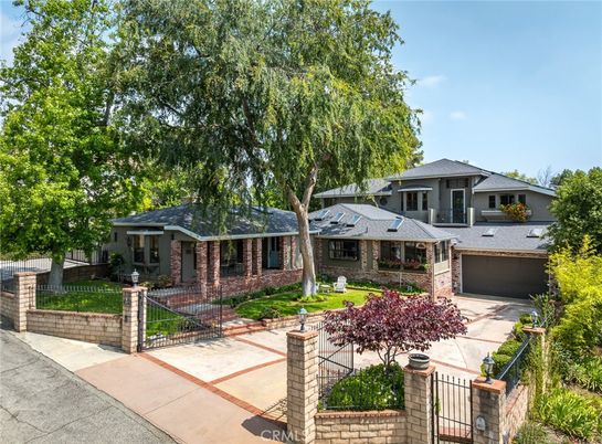 Attached, Exterior, Facade, Brick Facade, Solar Panels, American Foursquare