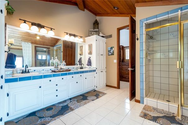 Bathroom, Dual Sink Vanities, Glass Shower, Interior, Recessed Lighting, Tile Countertops, Wooden Beams, Wooden Ceilings