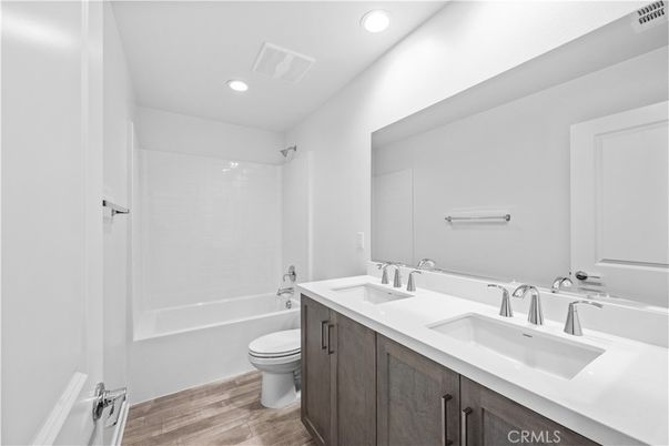 Bathroom, Dual Sink Vanities, Interior, Recessed Lighting, Wood Texture Flooring