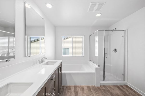 Bathroom, Dual Sink Vanities, Glass Shower, Interior, Recessed Lighting, Wood Texture Flooring