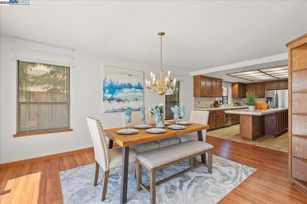 Chandelier, Dining room, Interior, Kitchen, Stainless Steel Appliances, Wood Texture Flooring