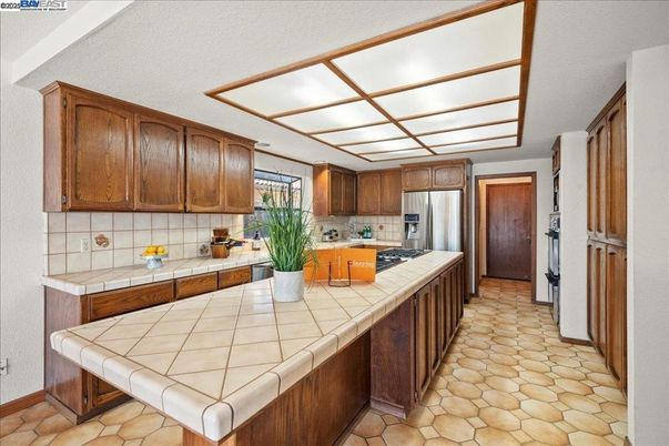 Interior, Kitchen, Stainless Steel Appliances, Tile Countertops