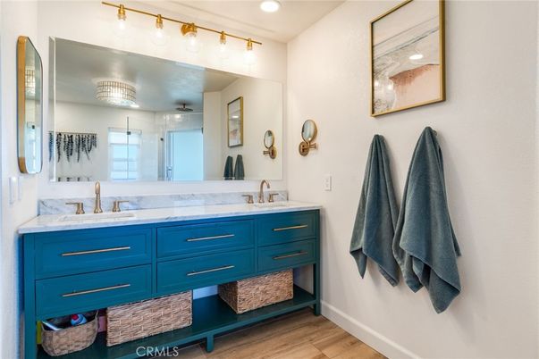 Bathroom, Dual Sink Vanities, Interior, Recessed Lighting, Wood Texture Flooring