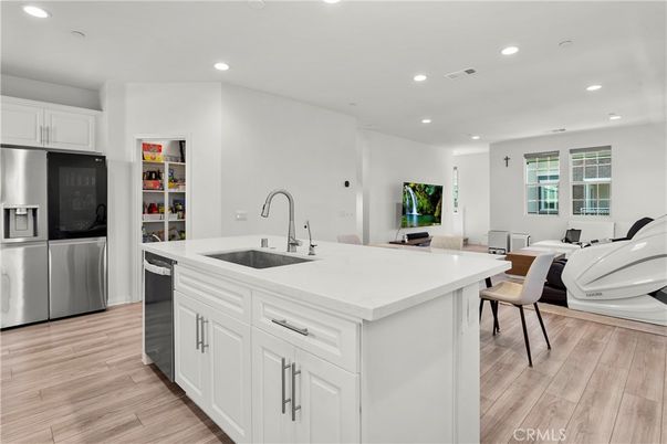 Dining room, Interior, Kitchen, Recessed Lighting, Stainless Steel Appliances, Wood Texture Flooring