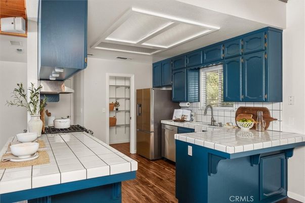 Interior, Kitchen, Stainless Steel Appliances, Tile Countertops, Wood Texture Flooring