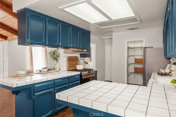 Interior, Kitchen, Tile Countertops, Wooden Beams, Wood Texture Flooring