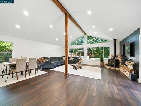Dining room, Fireplace, Interior, Living room, Recessed Lighting, Wooden Beams, Wood Texture Flooring